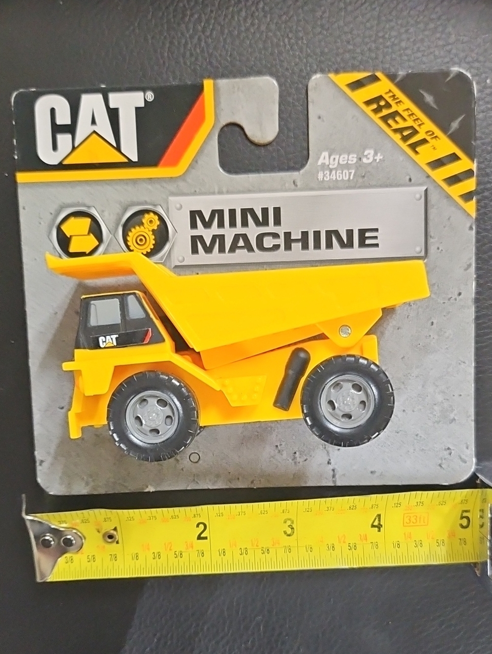 CAT Mini Machine Yellow Dump Truck Toy - Brand
